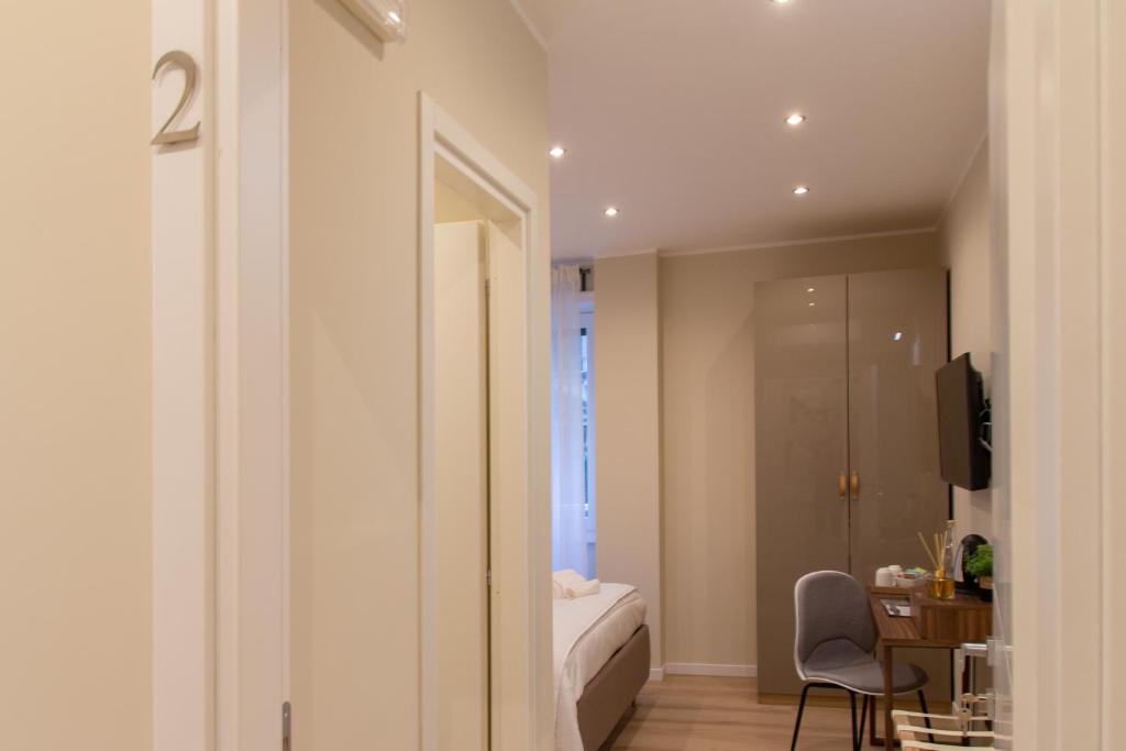 A bed or beds in a room at Prati 25.7 Suites in Rome