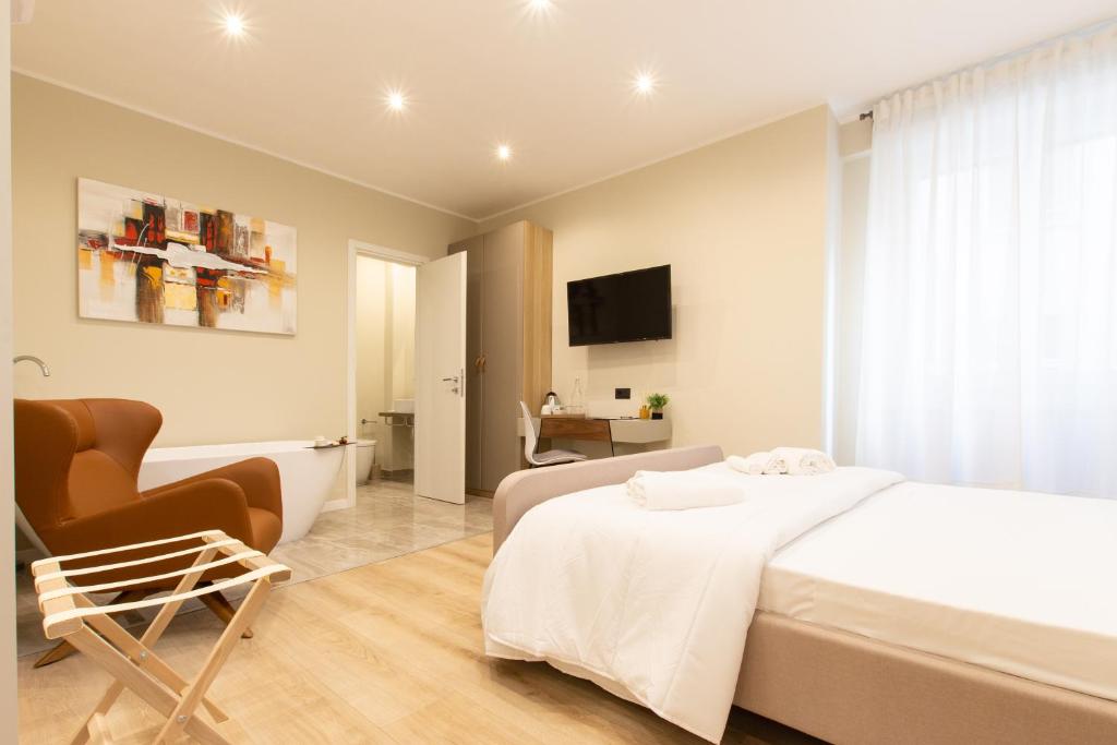 A bed or beds in a room at Prati 25.7 Suites in Rome