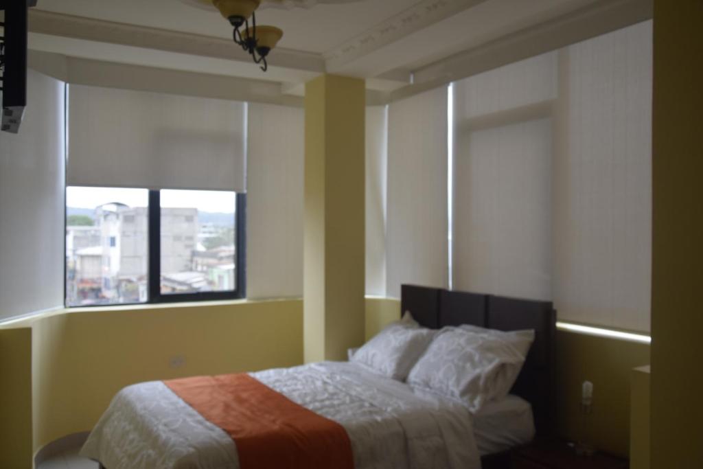 Postel nebo postele na pokoji v ubytování Olan´s Hotel Group