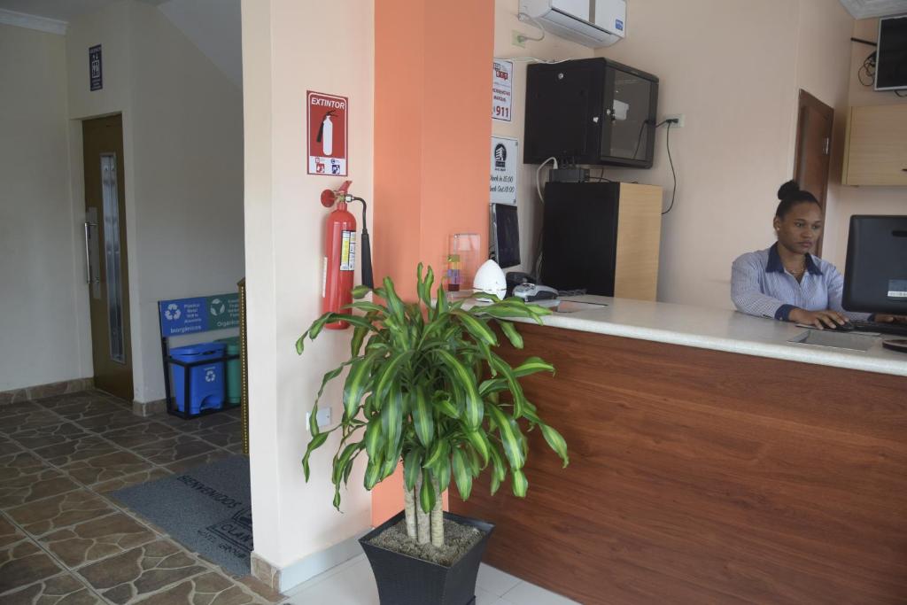 TV a/nebo společenská místnost v ubytování Olan´s Hotel Group