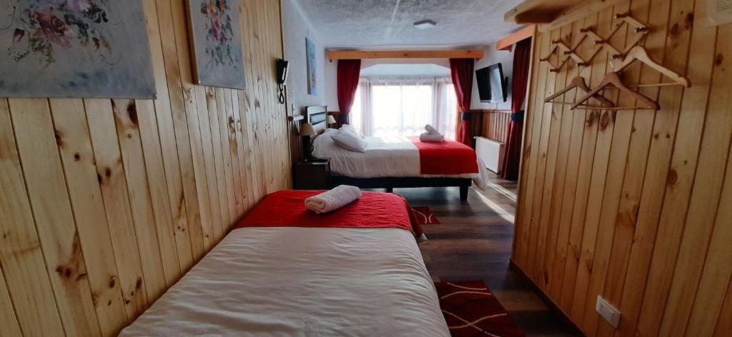 Postel nebo postele na pokoji v ubytování Hostal Vista al Mar hct