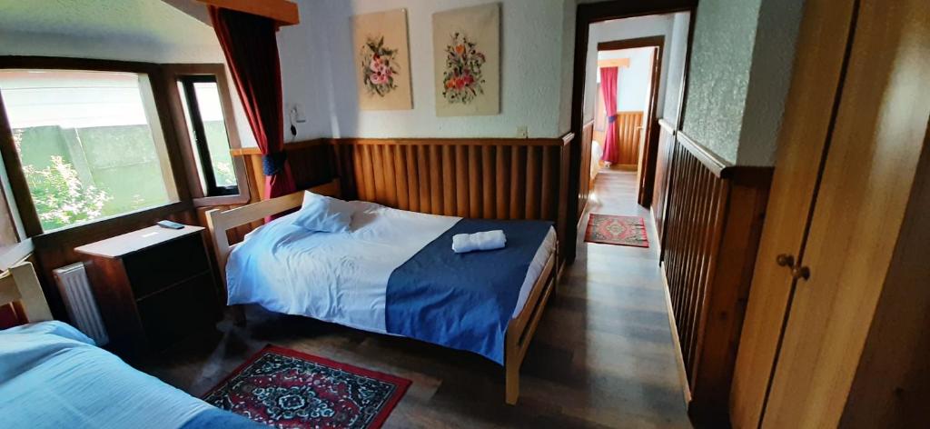 Postel nebo postele na pokoji v ubytování Hostal Vista al Mar hct