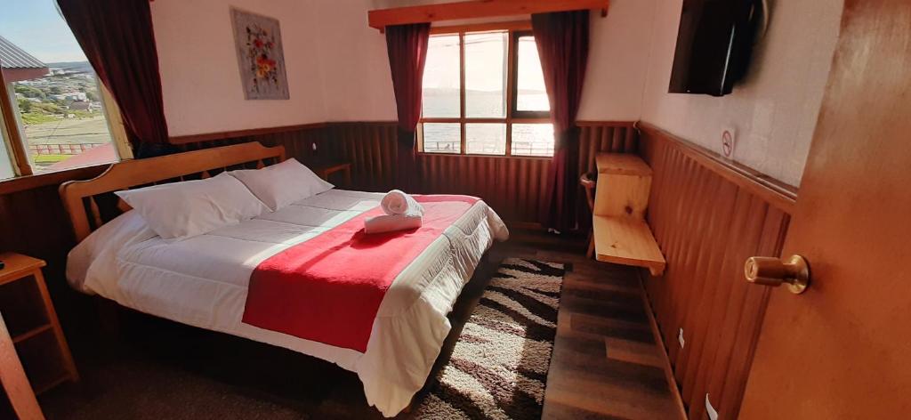 Postel nebo postele na pokoji v ubytování Hostal Vista al Mar hct