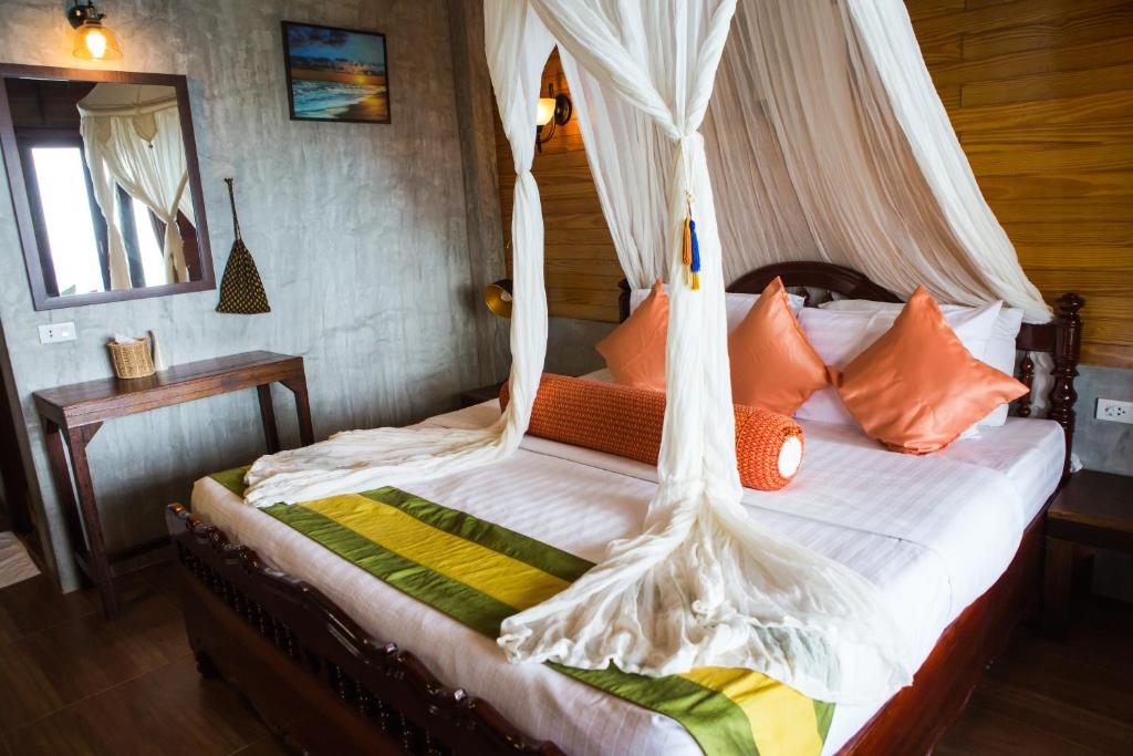 Postel nebo postele na pokoji v ubytování Sensi Paradise Beach Resort