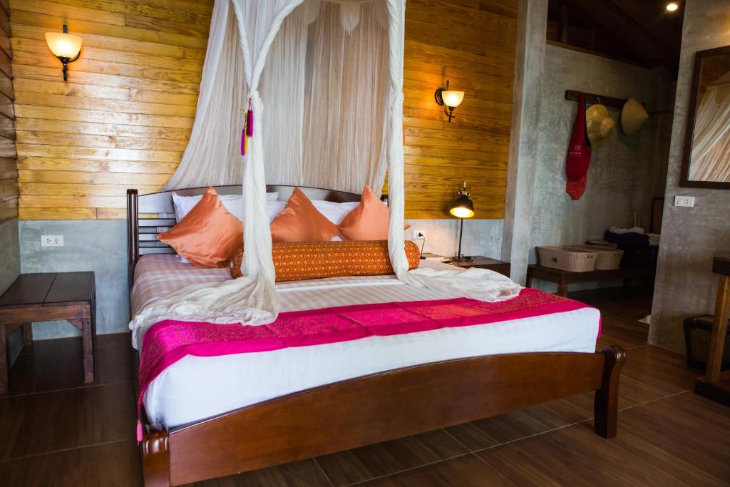 Postel nebo postele na pokoji v ubytování Sensi Paradise Beach Resort