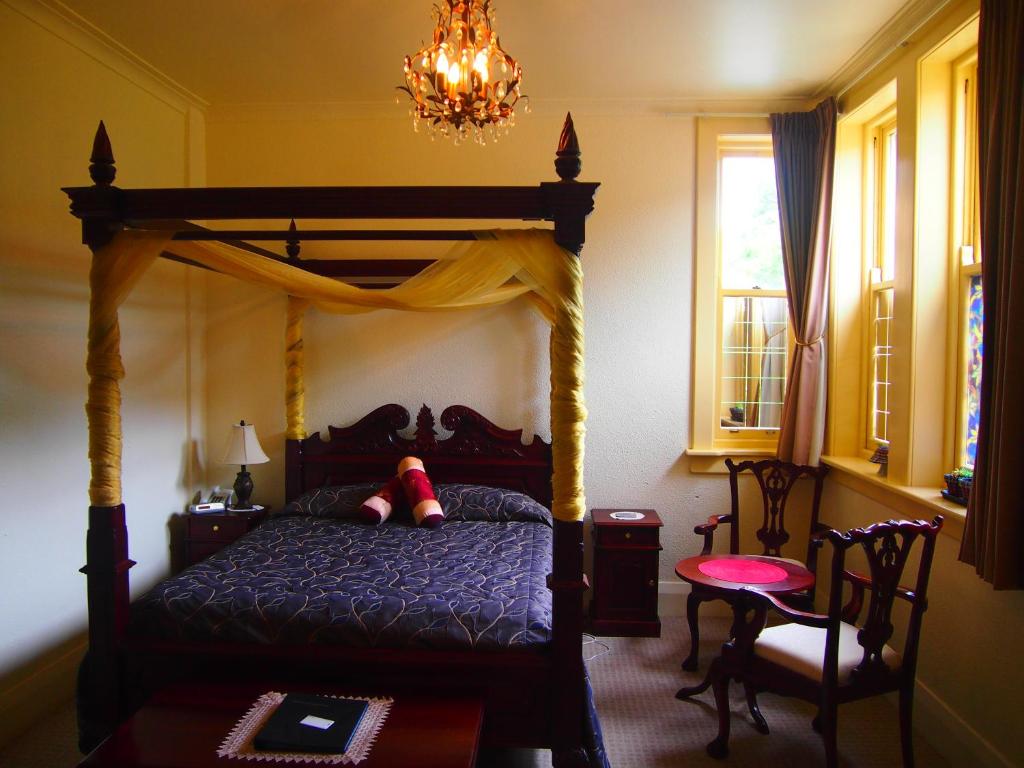Postel nebo postele na pokoji v ubytování Manor Views NZ