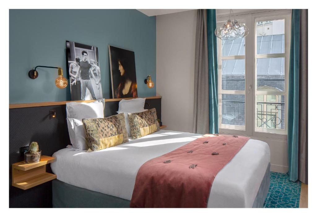 Lyric Hotel Paris Opera客房内的一张或多张床位