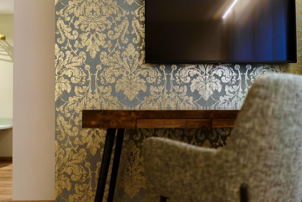 TV a/nebo společenská místnost v ubytování Hotel Rappen am Münsterplatz