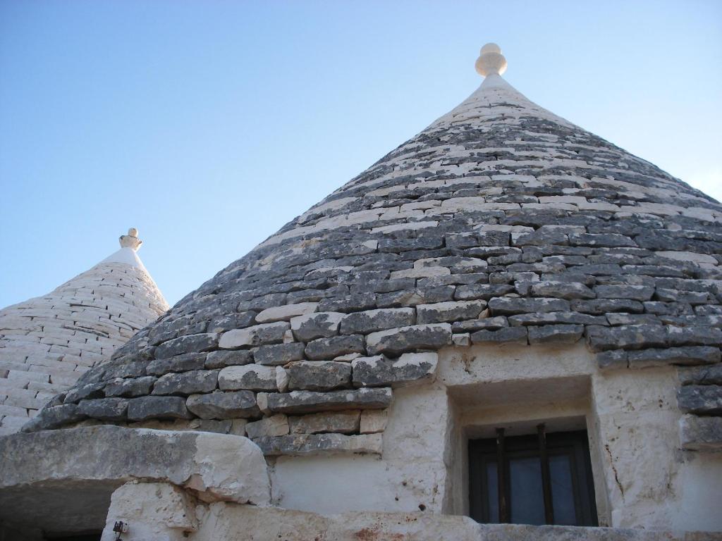 Fotografie z fotogalerie ubytování Trulli & Grotte Exclusive House v destinaci Castellana Grotte