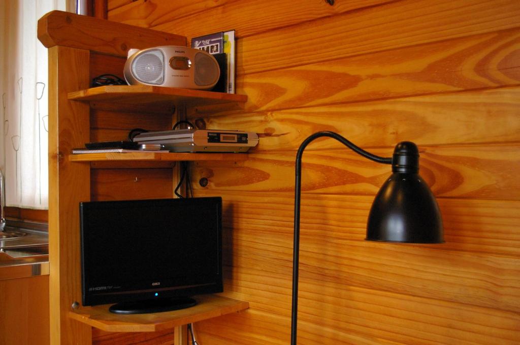 Utensilios para hacer té y café en Cabañas del Cortino