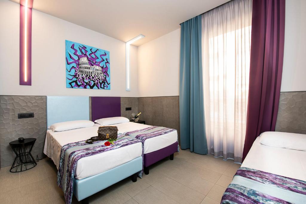 Postel nebo postele na pokoji v ubytování Hotel Relais Dei Papi