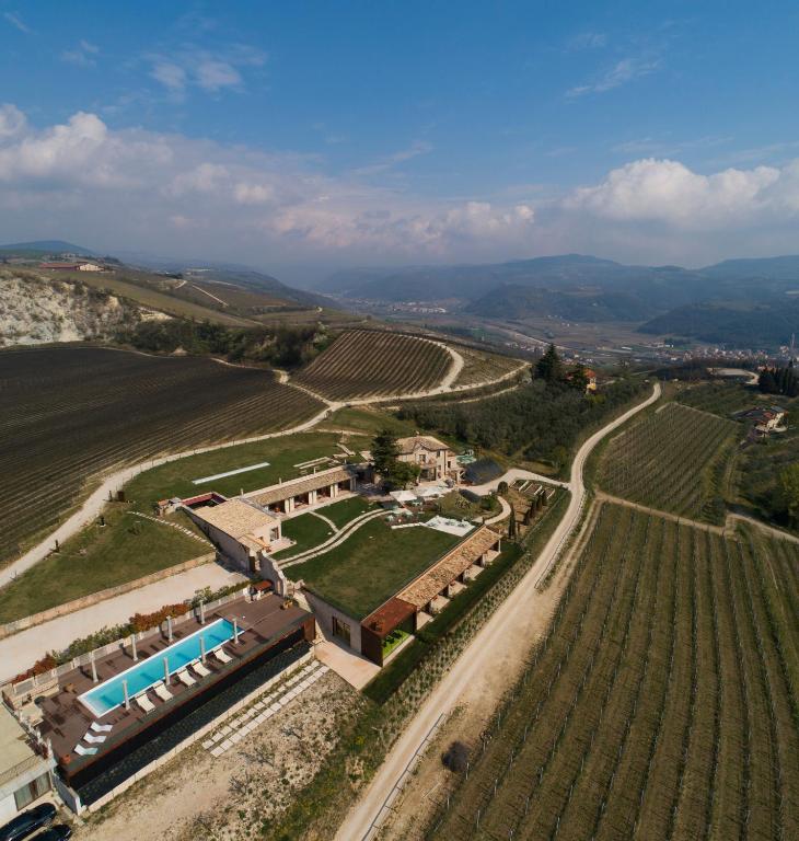an aerial view of a house in a vineyard at Tenuta Le Cave in Tregnago