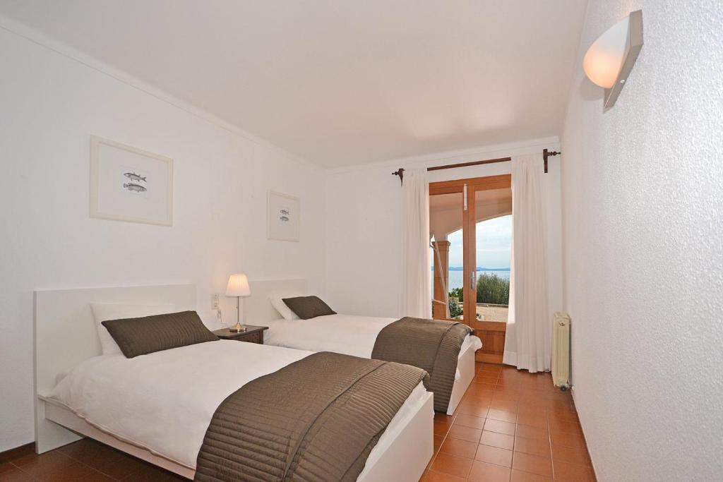 Postel nebo postele na pokoji v ubytování Villa Marinero - Can Torrens