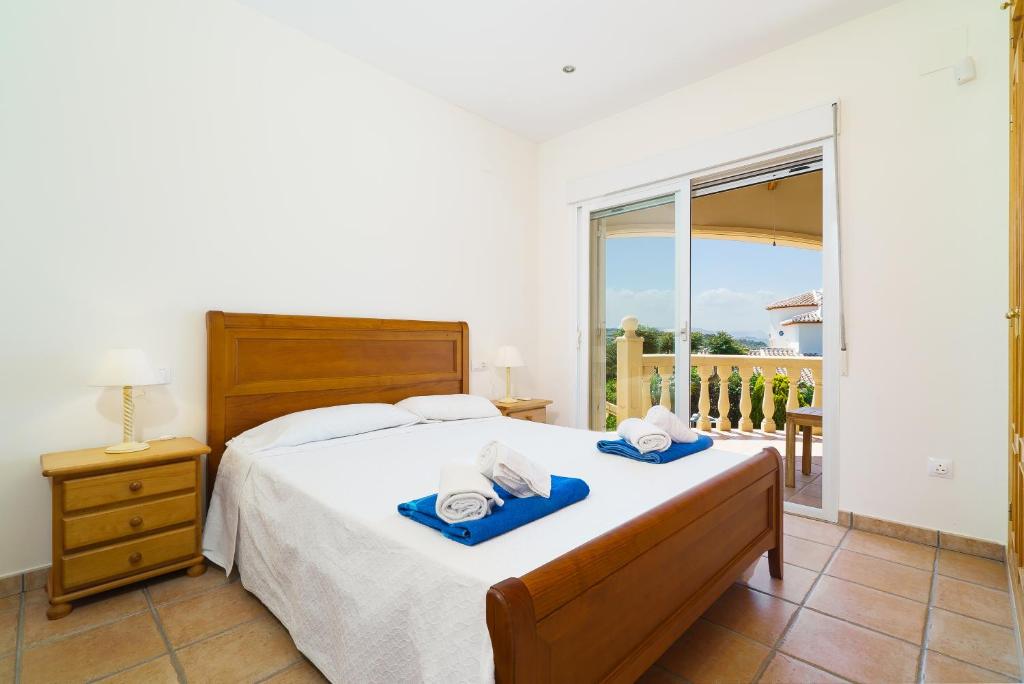 A bed or beds in a room at Casa Rio
