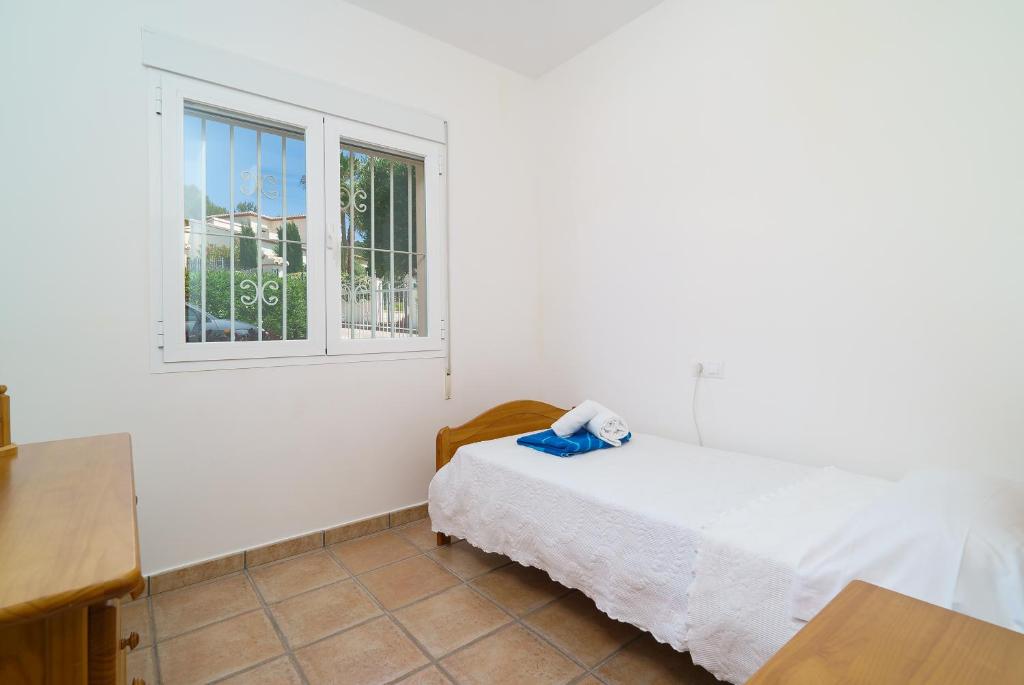 A bed or beds in a room at Casa Rio