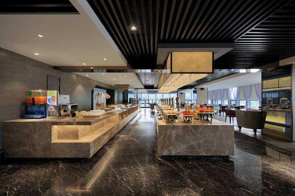 Restaurace v ubytování 汉永瑞酒店深圳宝安机场店