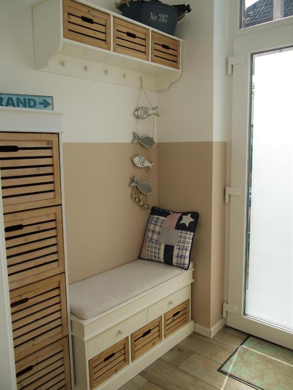Postel nebo postele na pokoji v ubytování Strandperle 2