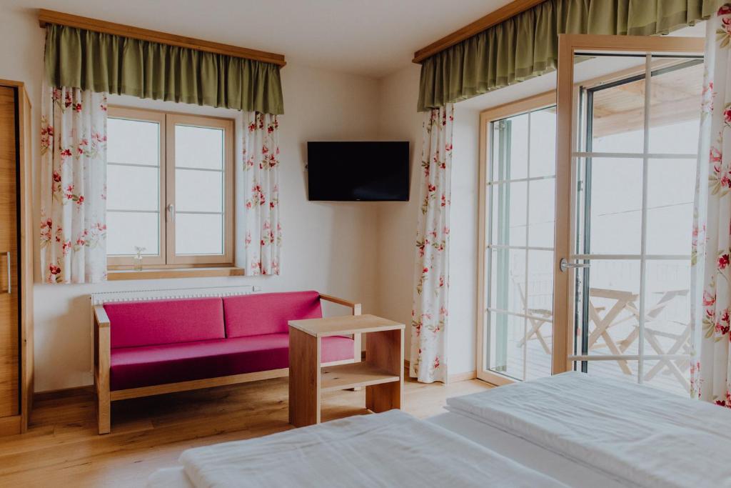 Postel nebo postele na pokoji v ubytování Winzerhaus am Gamlitzberg