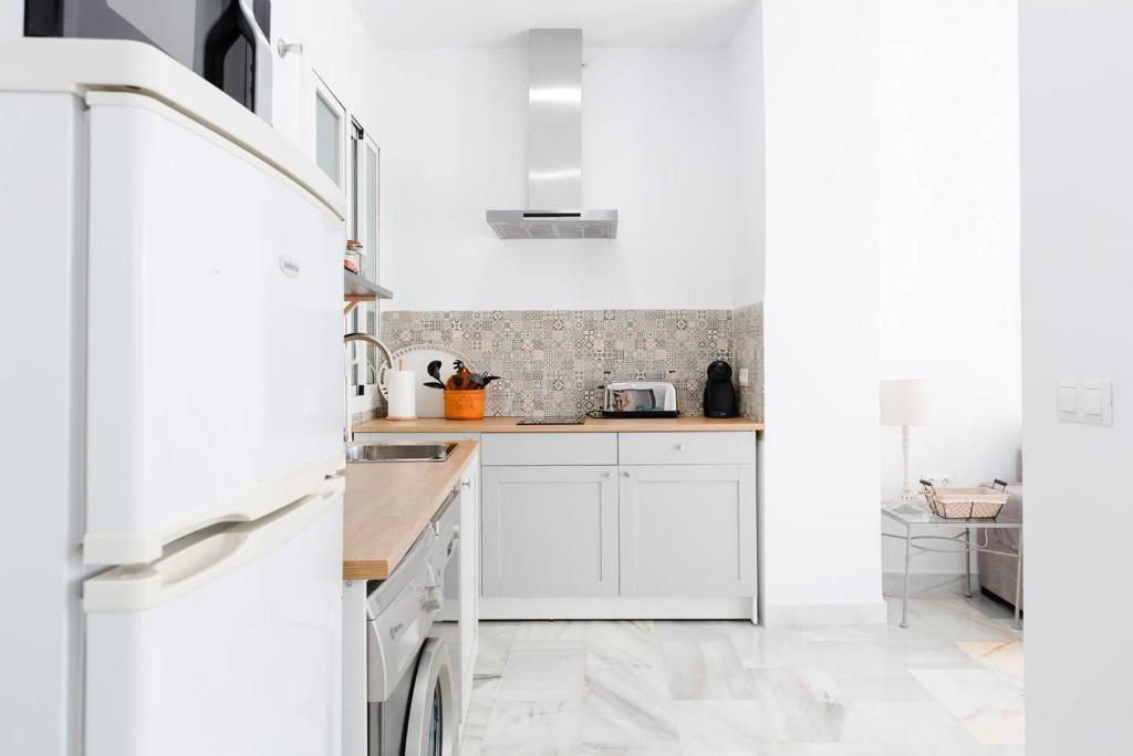 Kuchyňa alebo kuchynka v ubytovaní Loft en primera linea del paseo marítimo
