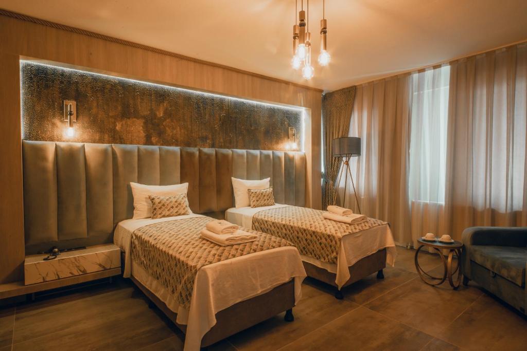 Postel nebo postele na pokoji v ubytování Edrin Gözde Hotel