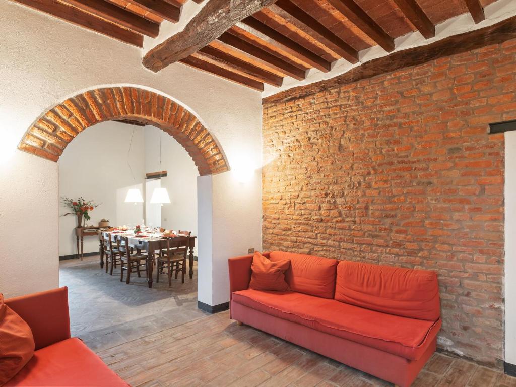 A seating area at Belvilla by OYO La Villetta