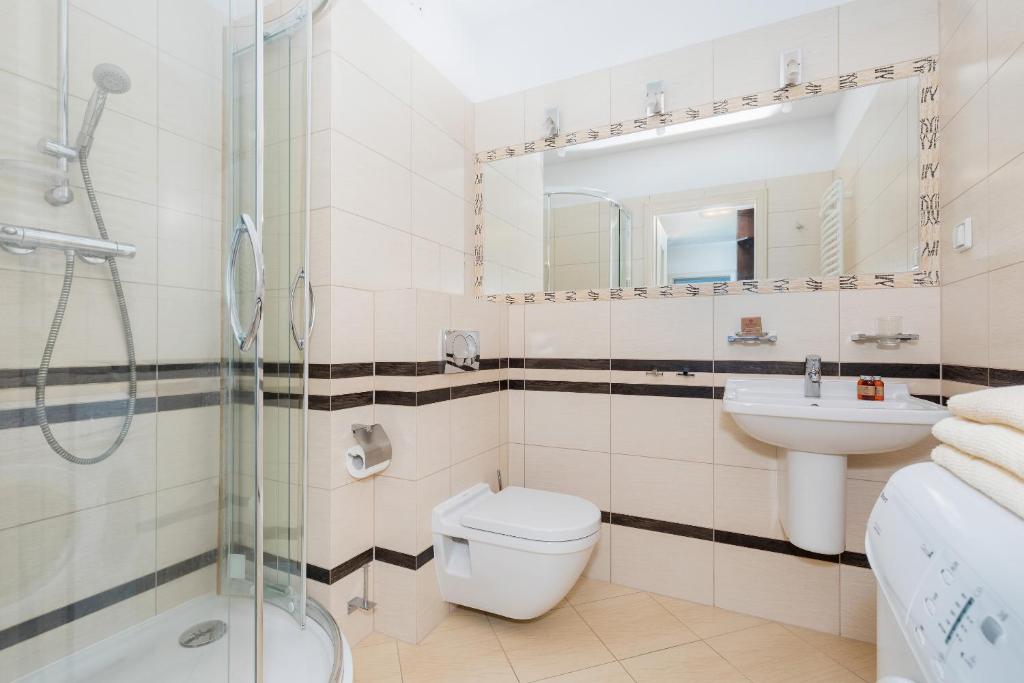 Kúpeľňa v ubytovaní Jantar Apartamenty- Zielone Tarasy