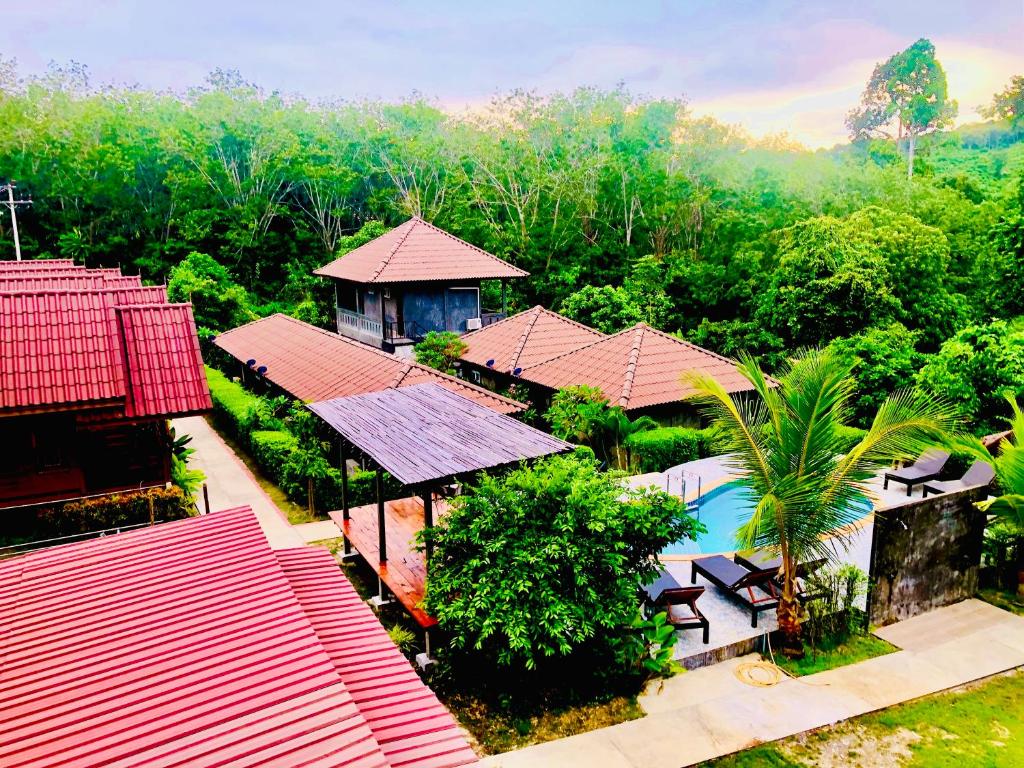 an aerial view of a resort with a swimming pool at Siam Lanta Resort - SHA Extra Plus in Ko Lanta