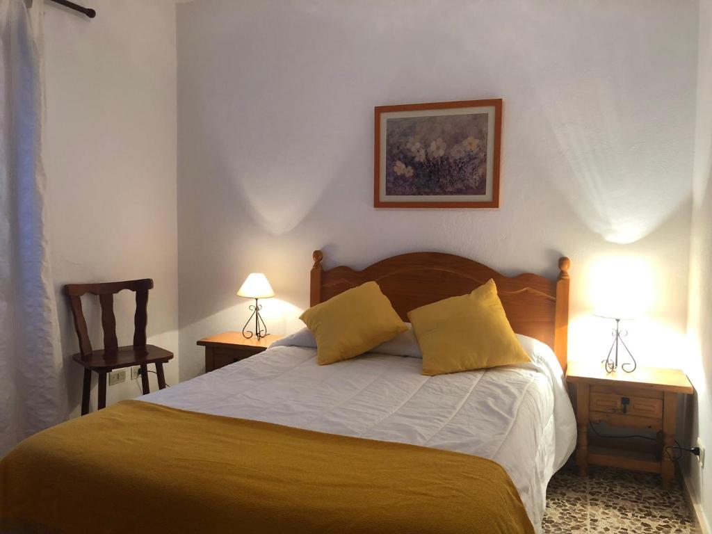 Postel nebo postele na pokoji v ubytování Vv. Casa La Fuente II