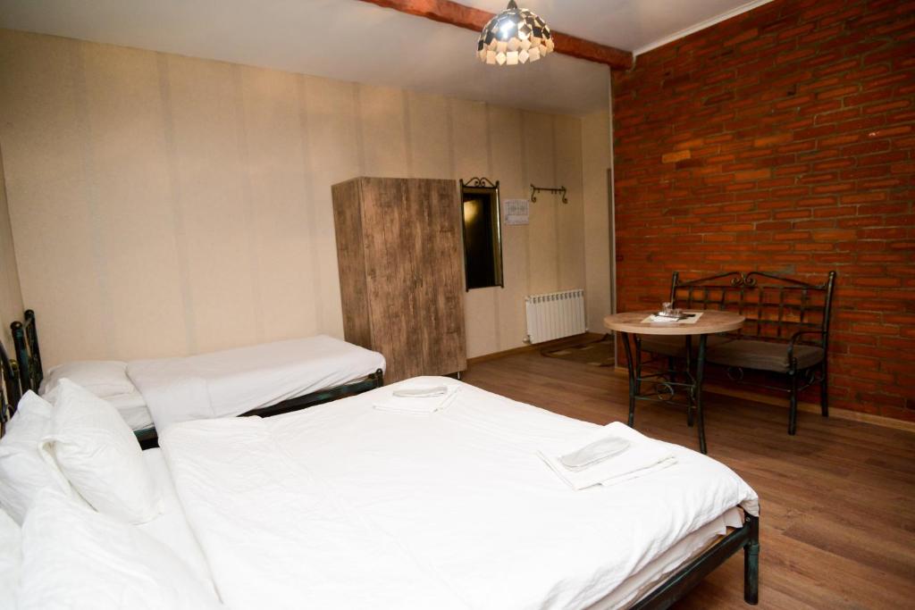 Postel nebo postele na pokoji v ubytování Hotel Ragnar
