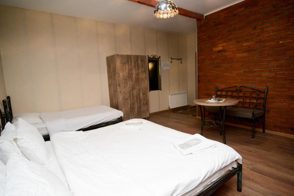 Postel nebo postele na pokoji v ubytování Hotel Ragnar