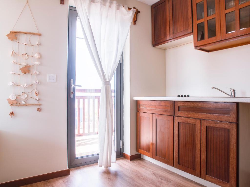 Kuchyň nebo kuchyňský kout v ubytování Angulo House