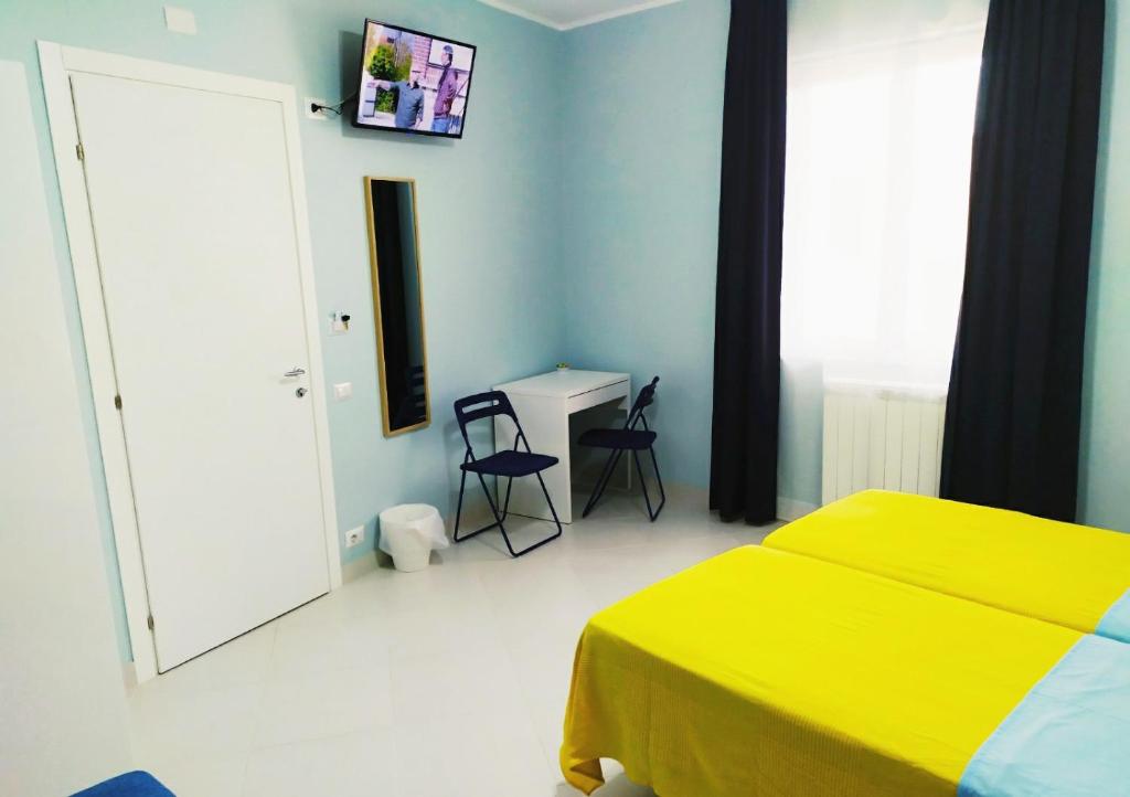TV a/nebo společenská místnost v ubytování Hello B&B