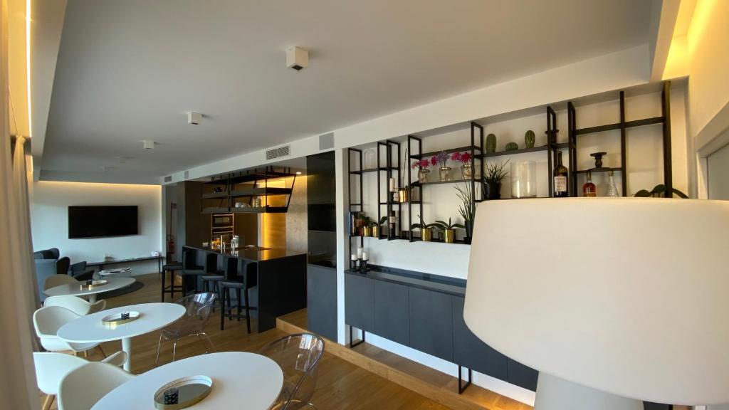 TV a/nebo společenská místnost v ubytování MYHOME 75 Premium Luxury B&B