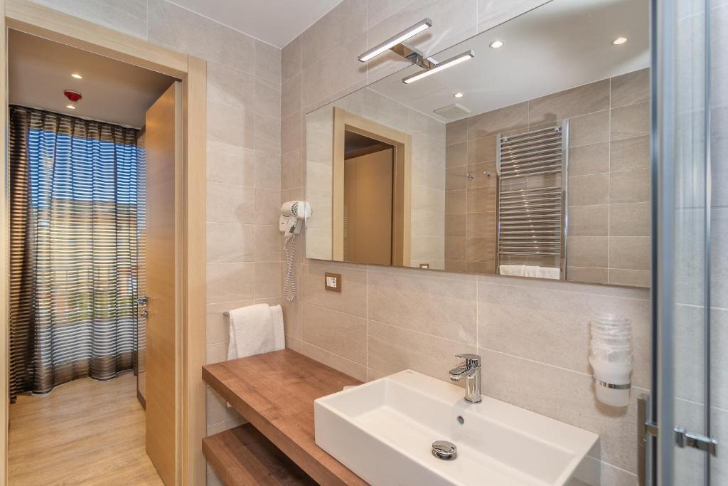 Koupelna v ubytování Hotel Pineta Mare
