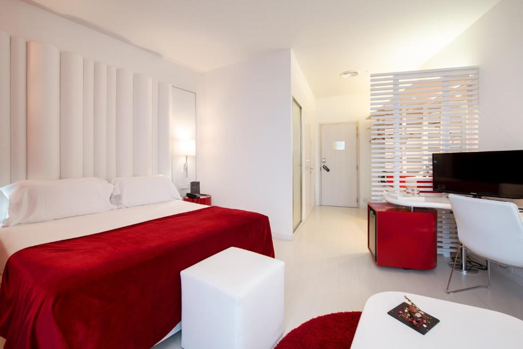 מיטה או מיטות בחדר ב-Hotel Porta Fira 4* Sup