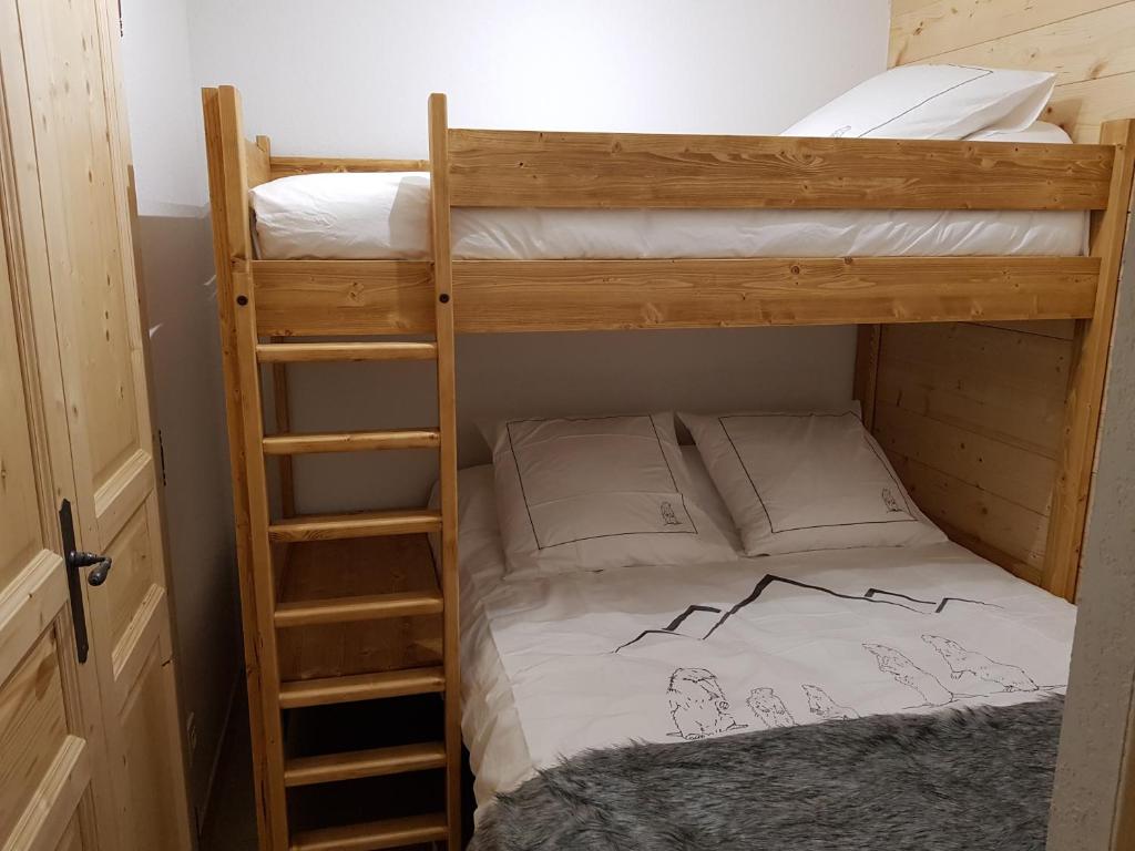 Postel nebo postele na pokoji v ubytování Résidence : Le Crystal Chalet