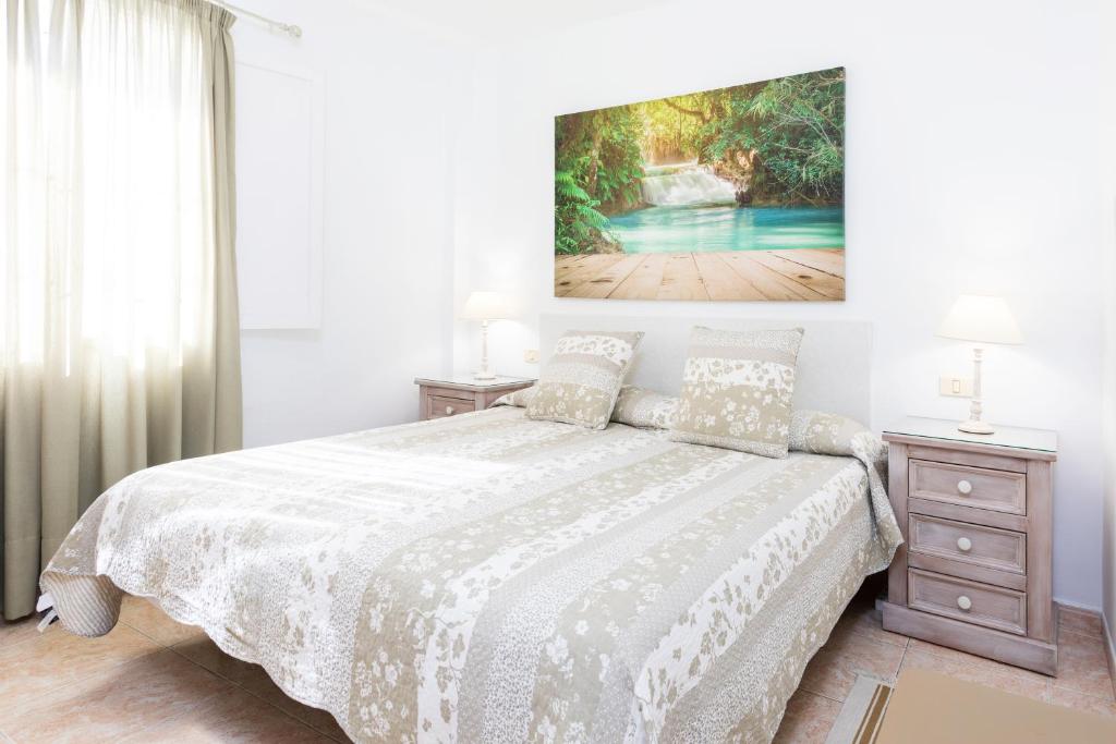 Postel nebo postele na pokoji v ubytování Vivienda vacacional La Laguna Deluxe 9
