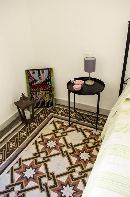 Postel nebo postele na pokoji v ubytování Ingrosso House
