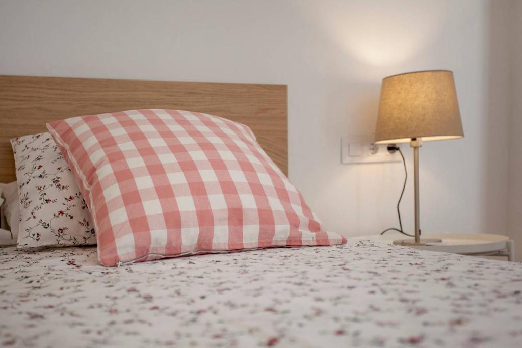 A bed or beds in a room at Habana Apartment