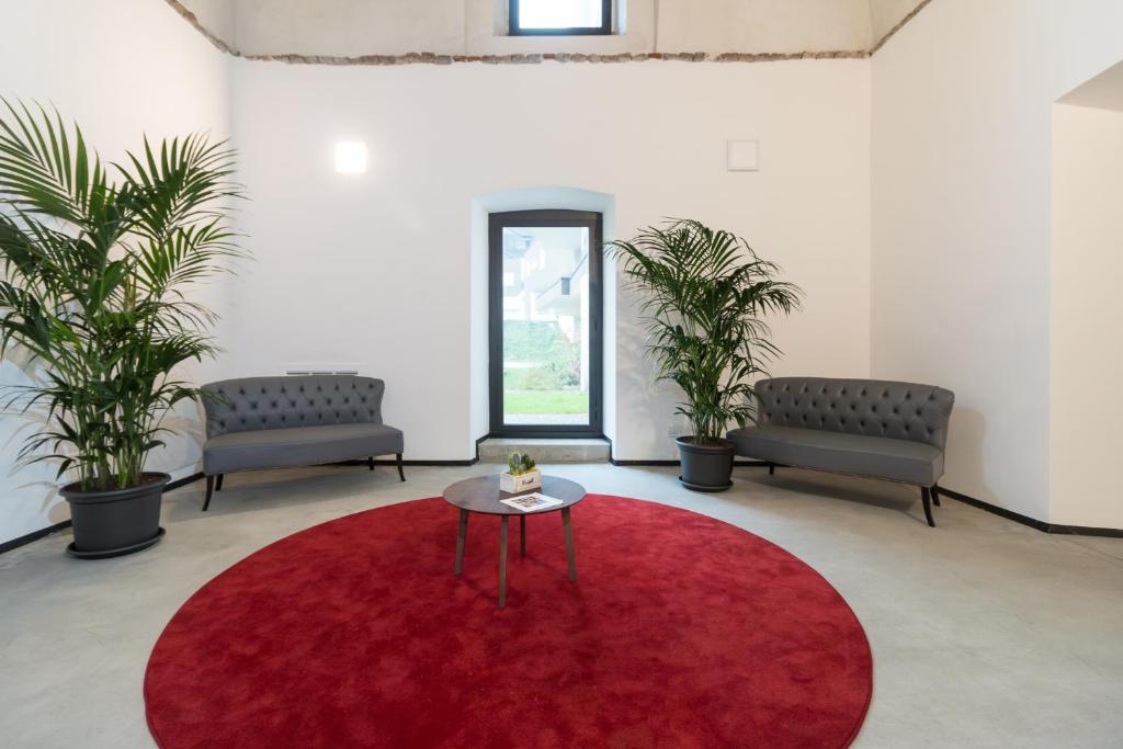 Posezení v ubytování Hotel Cascina Fossata & Residence