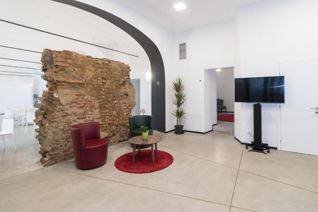 TV a/nebo společenská místnost v ubytování Hotel Cascina Fossata & Residence