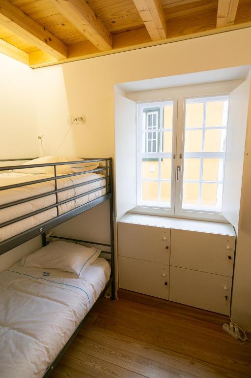 Postel nebo postele na pokoji v ubytování Change The World Hostels - Coimbra - Almedina
