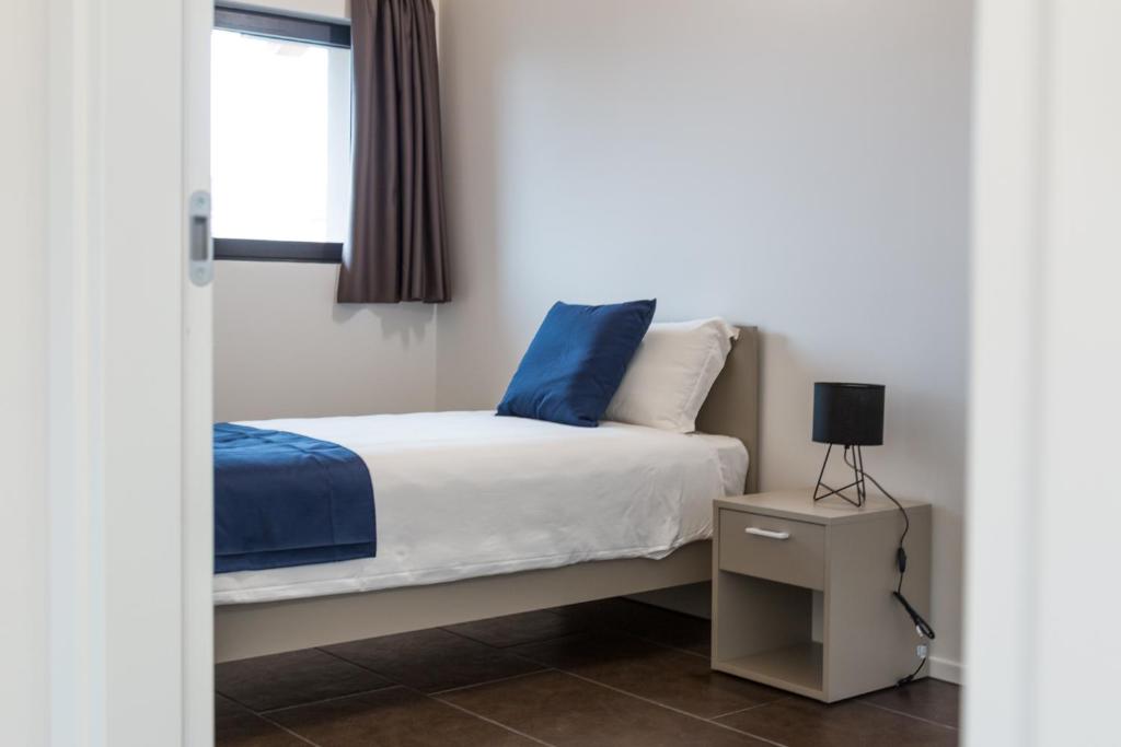 Postel nebo postele na pokoji v ubytování Hotel Cascina Fossata & Residence