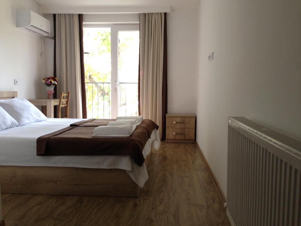 Postel nebo postele na pokoji v ubytování Hotel Continental