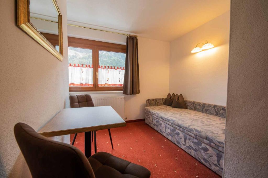 Postel nebo postele na pokoji v ubytování Haus Steinbock