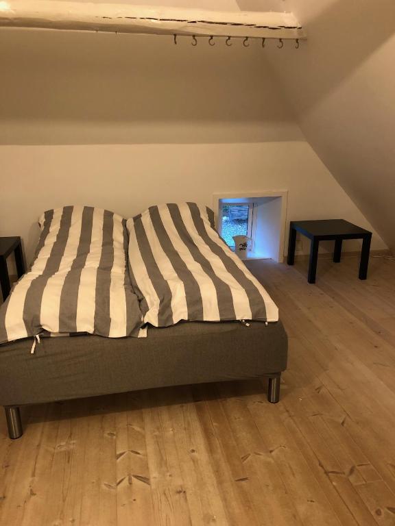 Postel nebo postele na pokoji v ubytování Agerfeld gl. skole