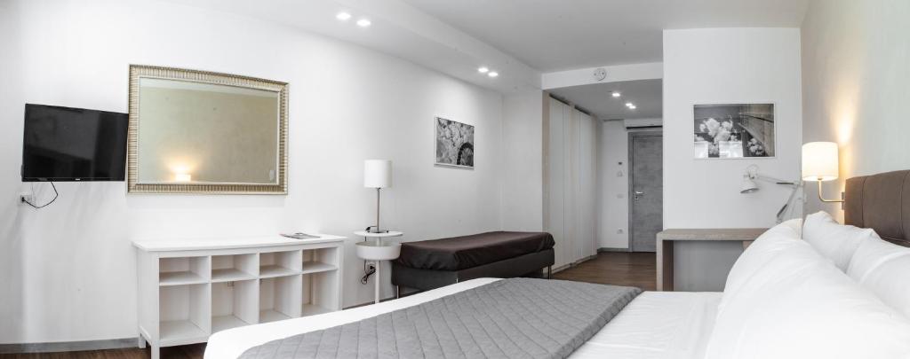 Postel nebo postele na pokoji v ubytování Prestige Rooms Chiaia