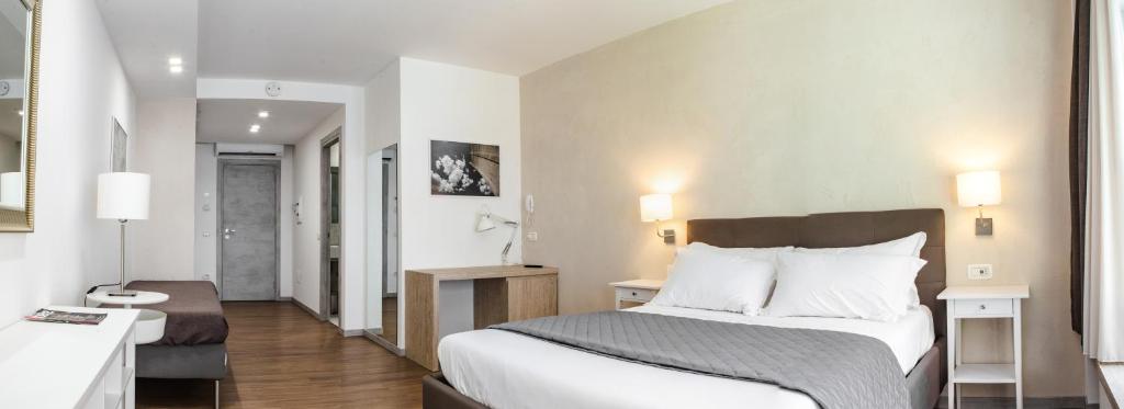 Postel nebo postele na pokoji v ubytování Prestige Rooms Chiaia