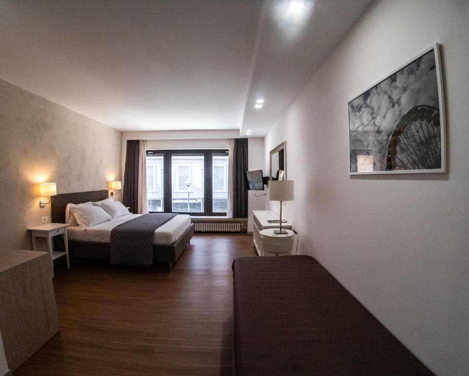 Postel nebo postele na pokoji v ubytování Prestige Rooms Chiaia
