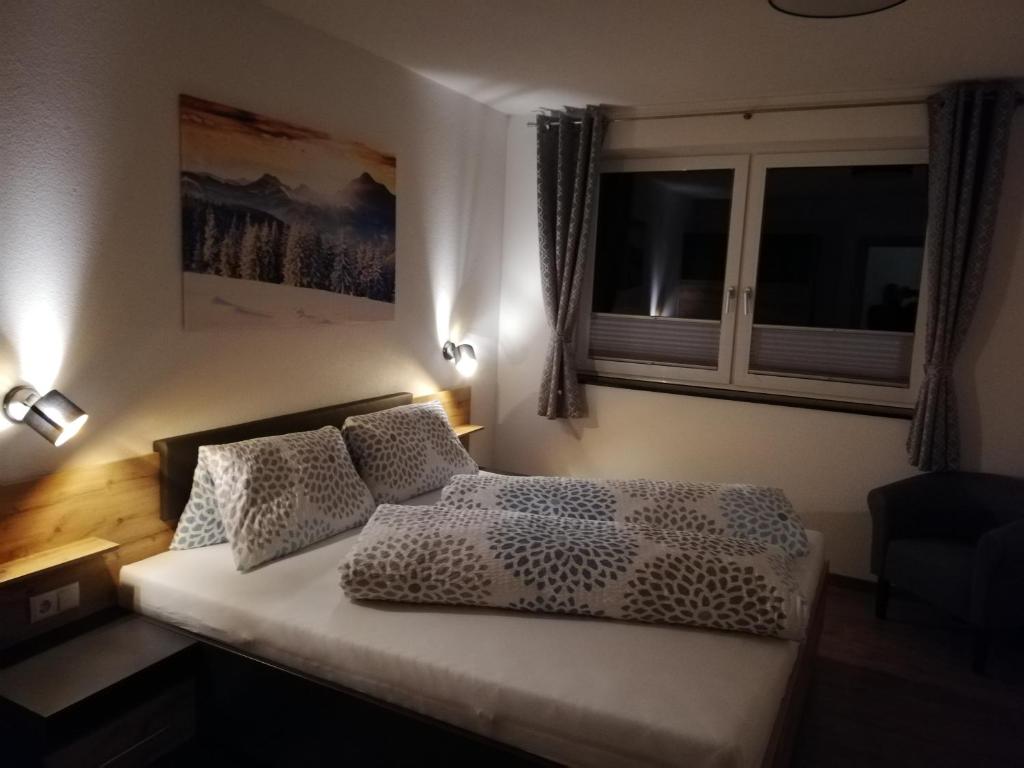 Posteľ alebo postele v izbe v ubytovaní Alpenapart Gastl